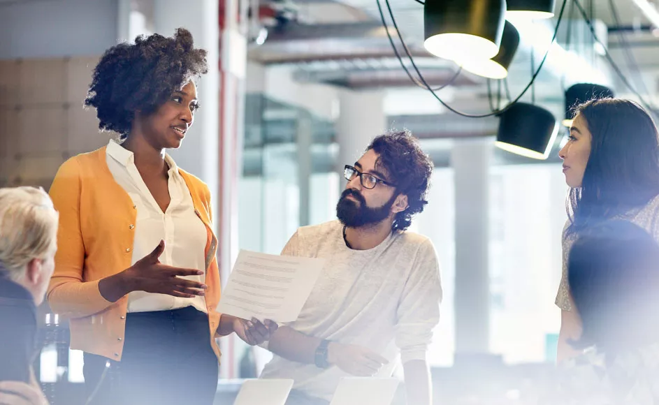 group of office workers having a discussion 