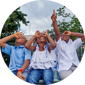 Kids with Nestle Pure Life water bottles