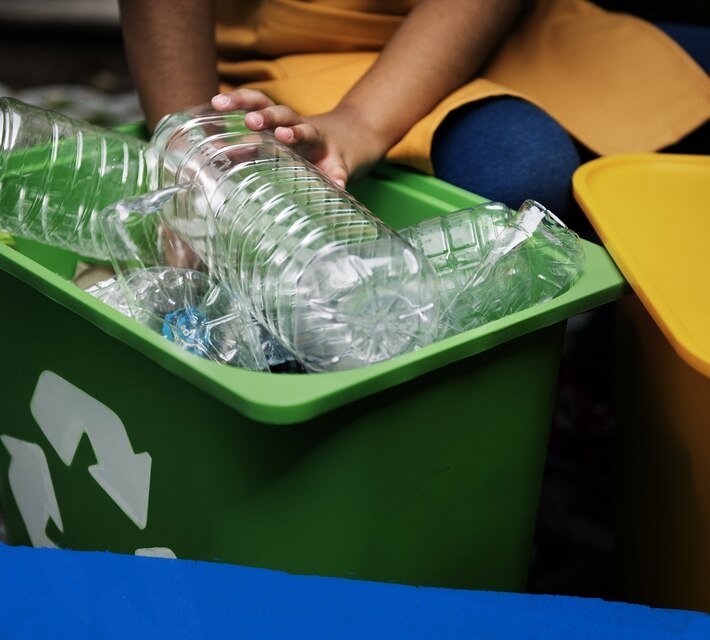 nestle-pure-life-green-recycling-bin-full-of-plastic-bottles