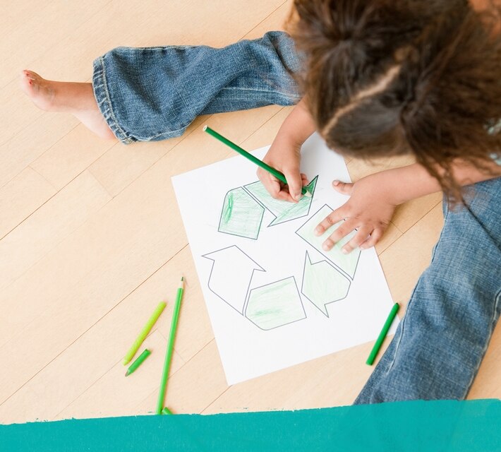 nestle pure life little girl drawing the recycle symbol