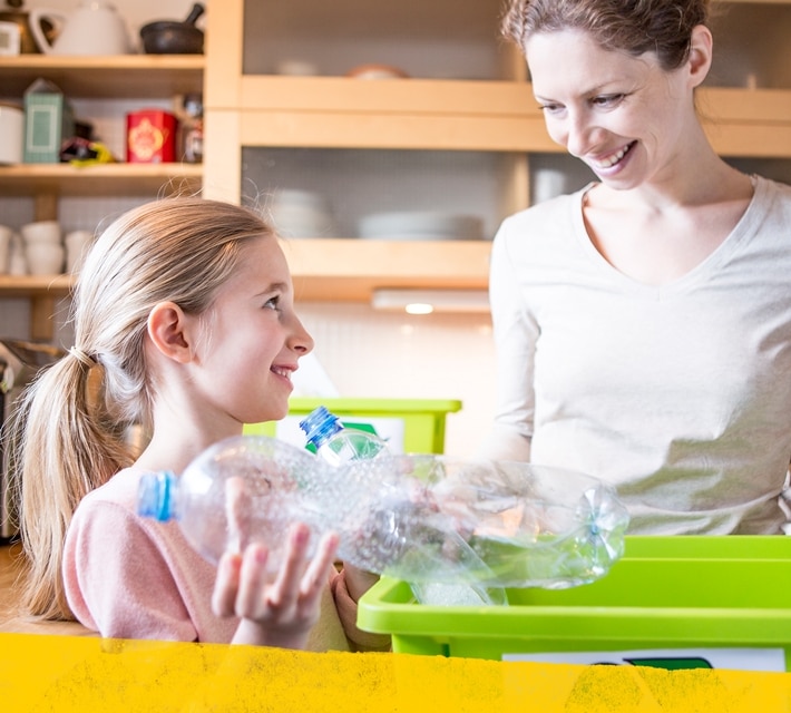 nestle pure life mum and girl using recycled materials