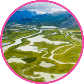 rivers running through grassy vista