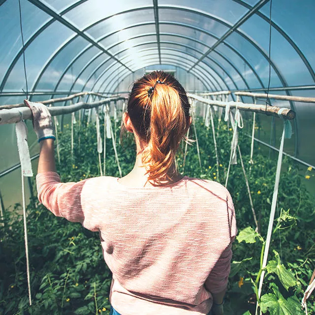 girl in greenhouse