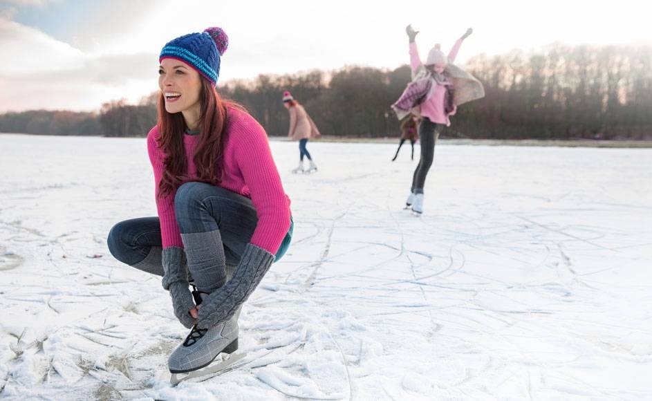 women skating on an ice ring