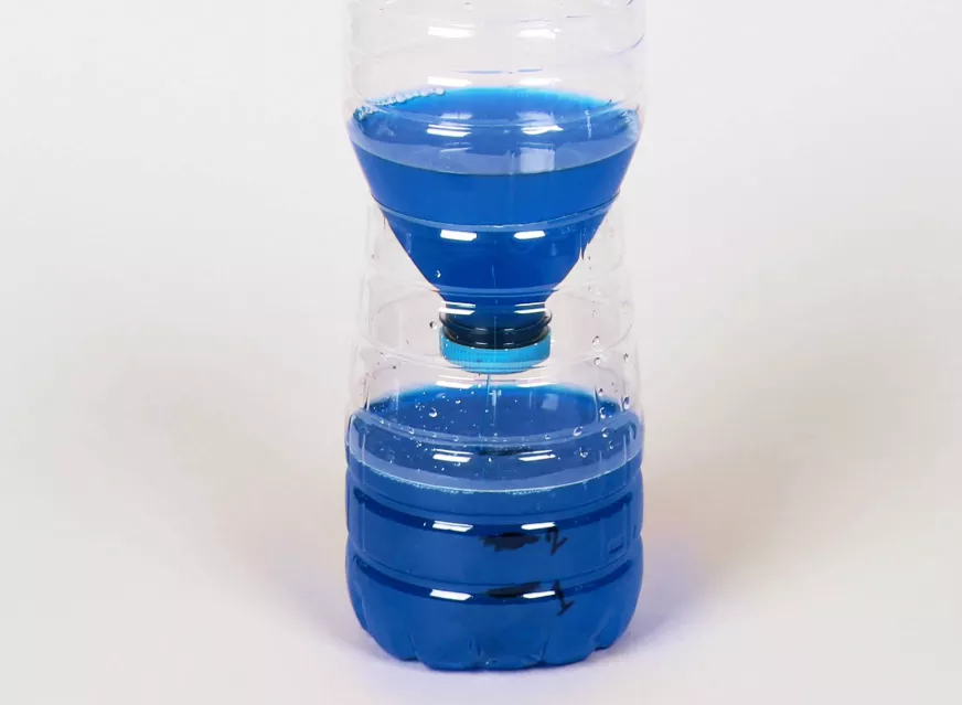 Water clock made out of a plastic water bottle
